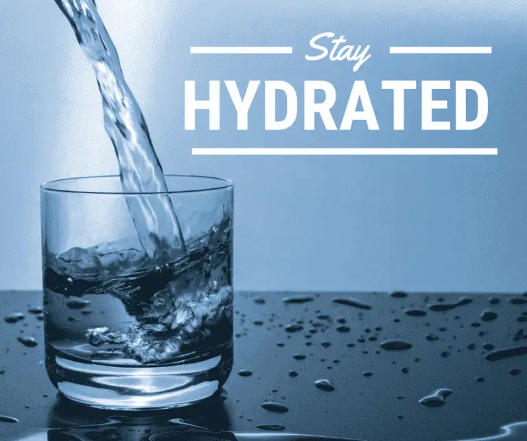 A glass of water with the text "Stay Hydrated" written on it.